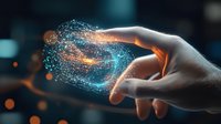 Glowing digital particles swirl around human finger touch, creating magical light effect against dark background with bokeh lights. Concept of digital transformation.
