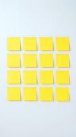 Sixteen yellow sticky notes arranged in neat grid pattern on white background for office organization and planning projects.
