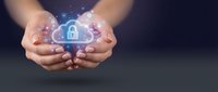 Hands holding glowing cloud security hologram with padlock icon, representing data protection, cybersecurity, and cloud computing technology solutions.