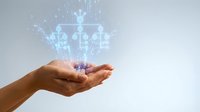 Hands holding glowing digital justice scales with data particles, representing legal technology, law firm innovation, and digital transformation in judiciary system.