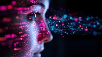 Side profile with glowing pink and blue digital particles dispersing from facial features against dark background, representing artificial intelligence and technology advancement.