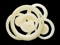 Sliced onion rings isolated on transparent background, ready for culinary design, food packaging, recipe graphics, cooking blogs, restaurant menus, and print-on-demand products.