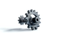 Metal sprocket gears on white background with soft shadow, industrial mechanical parts in minimalist composition for engineering and manufacturing concepts.