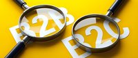 Two magnifying glasses with question marks visible through lenses on yellow background, representing search, investigation, curiosity, problem solving and discovery for web design and marketing materials.