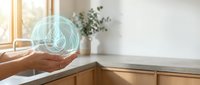 Hands holding glowing brain hologram in modern kitchen representing artificial intelligence, smart home technology, and digital innovation concepts.