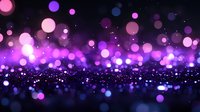 Magical purple and pink bokeh lights floating in dark space with glowing particles and blurred circles creating dreamy atmospheric background effect.