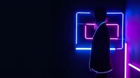 Silhouette of person standing near glowing neon squares in dark room with blue and purple lighting creating futuristic cyberpunk atmosphere for tech concepts.
