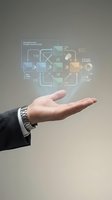 Businessman hand holding organizational chart with strategic alignment flowchart and business process diagram icons for corporate management and workflow planning.