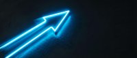 Glowing neon arrow pointing upward on dark background, representing growth, success, and forward momentum for business and technology concepts.