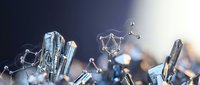 Abstract crystal formations with floating molecular structures on dark background for science and technology concepts.