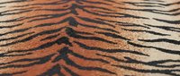 Zebra stripe pattern in warm rust and black tones on textured fabric surface, suitable for fashion design, upholstery, and textile printing projects.