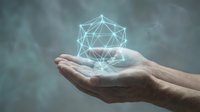 Hands holding glowing geometric wireframe network sphere against blurred background, representing digital connectivity, data technology, and innovation for business concepts.