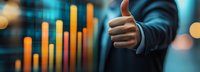 Businessman showing thumbs up approval gesture with financial growth chart in background, indicating successful investment strategy and positive market performance.