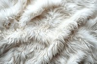 Luxurious white faux fur texture with soft fluffy fibers creating wavy pattern. Close-up macro photography showing plush fabric detail for fashion and interior design.