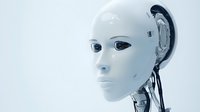 Futuristic android head with white facial features and metallic components against light background, representing artificial intelligence and robotics advancement.