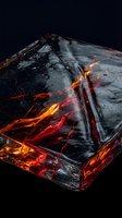 Molten lava flowing through cracked volcanic rock formation with glowing orange and red fire streams against dark background for dramatic nature concepts.