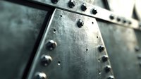 Riveted metal surface with industrial steel plates and bolts in dark green tones, showing weathered texture and structural details. Macro photography.