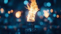 Dramatic orange flames erupting from metal burner against blurred blue bokeh background, creating atmospheric mood lighting effect for outdoor evening ambiance.