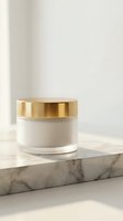 Luxury cosmetic jar with golden lid on marble surface for premium skincare and beauty product packaging mockup.