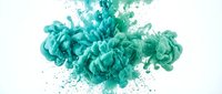 Turquoise ink cloud explosion dispersing in water creating abstract fluid motion patterns for creative design projects and artistic backgrounds.