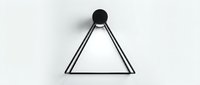 Minimalist black geometric lamp with triangle frame and round top, mounted on white wall, modern interior lighting design concept.