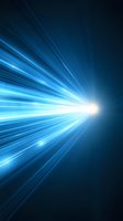 Bright light source emitting intense blue rays against dark background, creating dynamic motion effect and perspective depth for technology and energy concepts.
