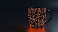 Copper circuit board pattern coffee mug with electronic pathways design on dark background for tech enthusiasts and engineers.