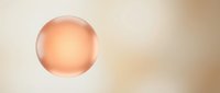 Soft peachy-pink glowing sphere isolated on neutral beige background, suitable for design projects, web graphics, and digital artwork applications.