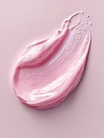 Pink cosmetic cream smear with pearly texture and smooth swirl pattern on light background, showing luxurious skincare product consistency and application.