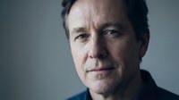 Middle-aged Caucasian businessman portrait with serious expression and confident gaze for corporate leadership and professional headshot concepts.