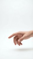 Human hand reaching out with fingers extended in grasping motion against clean white background for design projects and presentations.