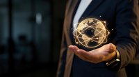 Professional businessman in dark suit holding glowing golden network sphere with connected nodes representing global connectivity and digital transformation.