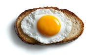 Sunny side up fried egg on toasted bread slice with crispy edges and bright yellow yolk, isolated on white background for food and breakfast designs.