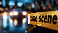 Yellow crime scene tape with blurred city lights in background creates dramatic atmosphere for law enforcement, investigation and emergency response themes.