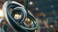 Abstract metallic spiral sculpture with flowing curves and reflective surfaces creating dynamic movement against blurred bokeh background for modern design.