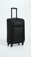 Black wheeled suitcase with telescopic handle isolated on white background for travel and vacation concepts.