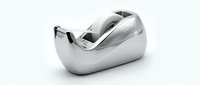 Metallic silver tape dispenser isolated on white background, ready for office and design use.
