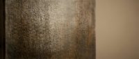 Natural burlap fabric texture with soft lighting creates warm earthy background for rustic design projects and organic material concepts.
