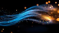 Glowing blue wave with golden sparkles and bokeh effects on black background creates magical light trail effect for luxury designs and celebrations.