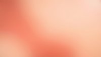 Abstract coral pink gradient background with soft blurred transitions from warm orange to peachy tones for modern design projects and presentations.