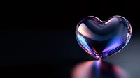 Glossy transparent heart with blue and pink iridescent reflections on dark background with dramatic lighting and soft glow effect. Suitable for romantic designs.