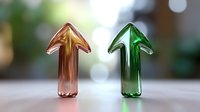 Metallic copper and green glass arrows pointing upward on blurred background, symbolizing growth, progress and business success indicators.