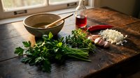 Fresh herbs parsley chives garlic onion wooden cutting board rustic kitchen cooking ingredients preparation culinary food styling natural light.