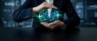 Businessman hands protecting glowing digital brain with neural network connections representing artificial intelligence and machine learning technology.