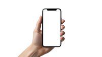 Hand holding modern smartphone with blank white screen isolated on white background for app presentation and digital mockup design.