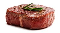 Juicy grilled beef steak fillet garnished with fresh green chives on white background, raw meat texture visible, isolated food photography for restaurant menu.