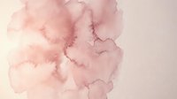 Soft pink watercolor ink wash with organic flowing shapes on white background, isolated for design projects, invitations, and branding applications.