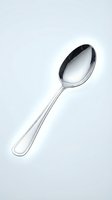 Elegant silver spoon isolated on white background for kitchen utensil design and culinary projects.