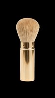 Makeup brush with natural bristles and gold metal handle, isolated on transparent background. Ready for clipart, t-shirt design, print-on-demand, sublimation, and sticker applications.
