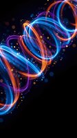 Vibrant neon light trails swirling in dynamic motion with glowing particles and bokeh effects on black background for digital art and technology designs.